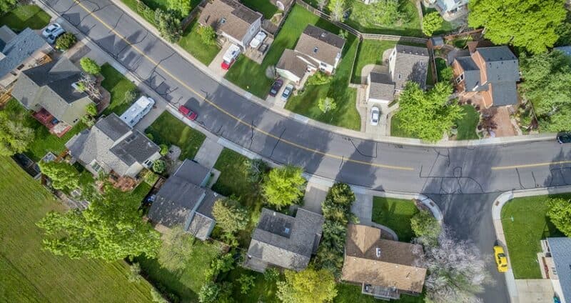 aerial view of neighborhood and road